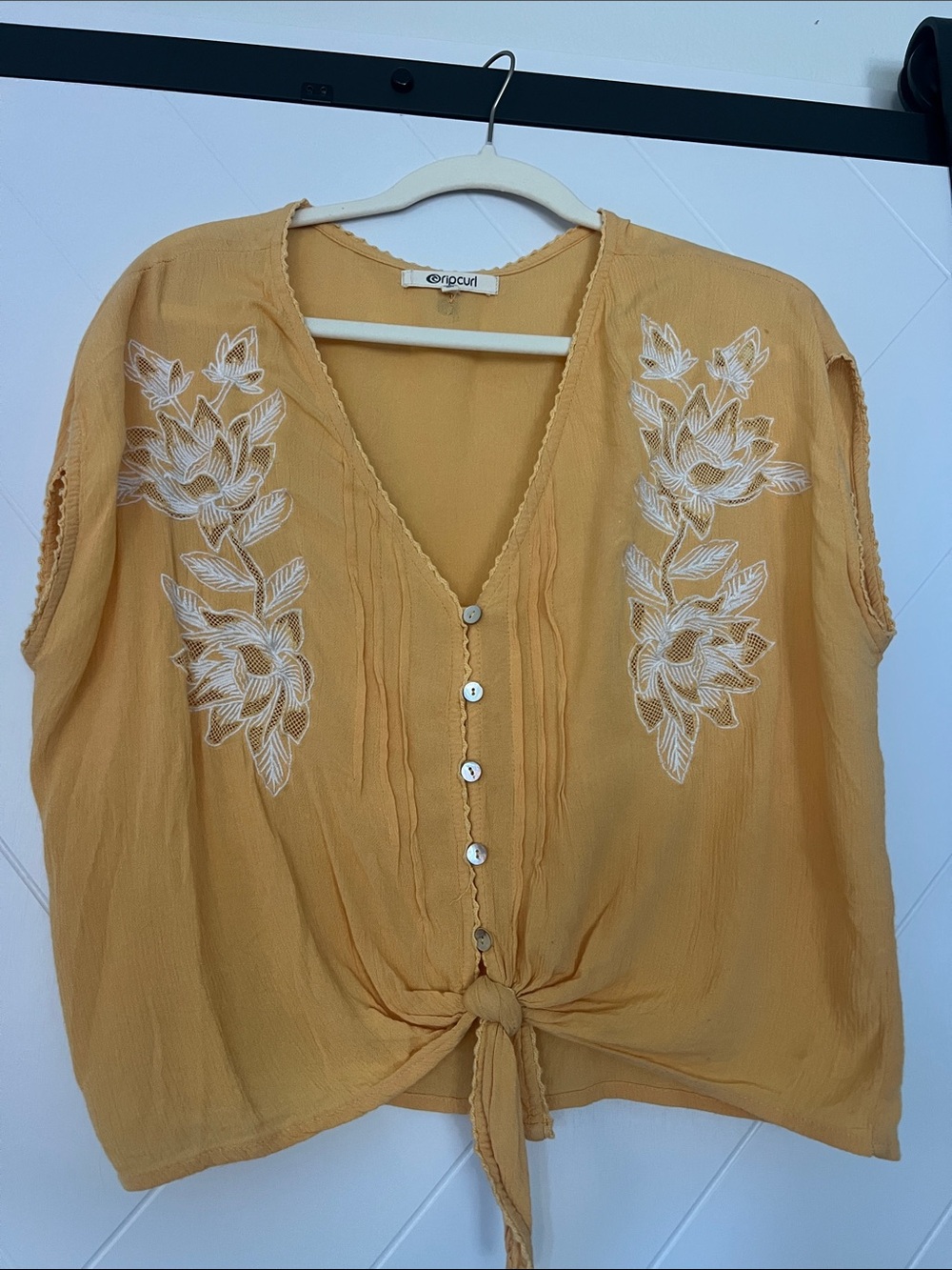 Rip Curl Mustard Yellow Button-Front Tie Hem Top with White Floral Embroidery